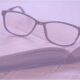 gafas encima de un libro abierto